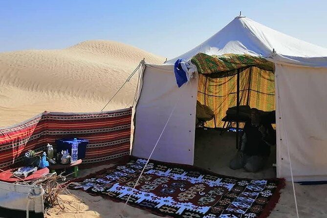 2 days tour to Douz & Ksar Ghilan oasis. and an overnight in the sahara under bedouin tent .. Dinner in the camp, Private Jeep - with english speaking guide. - Ksar Ghilane: hot water, palms, and optional rides