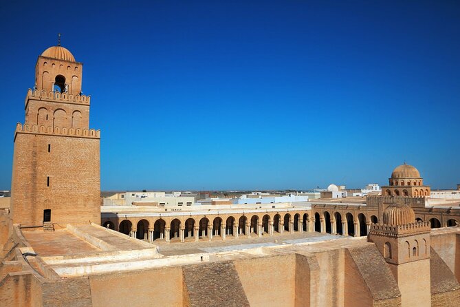 Kairouan & El Djem Guided Day Trip with Lunch from Hammamet - Entering El Jem’s Roman amphitheatre